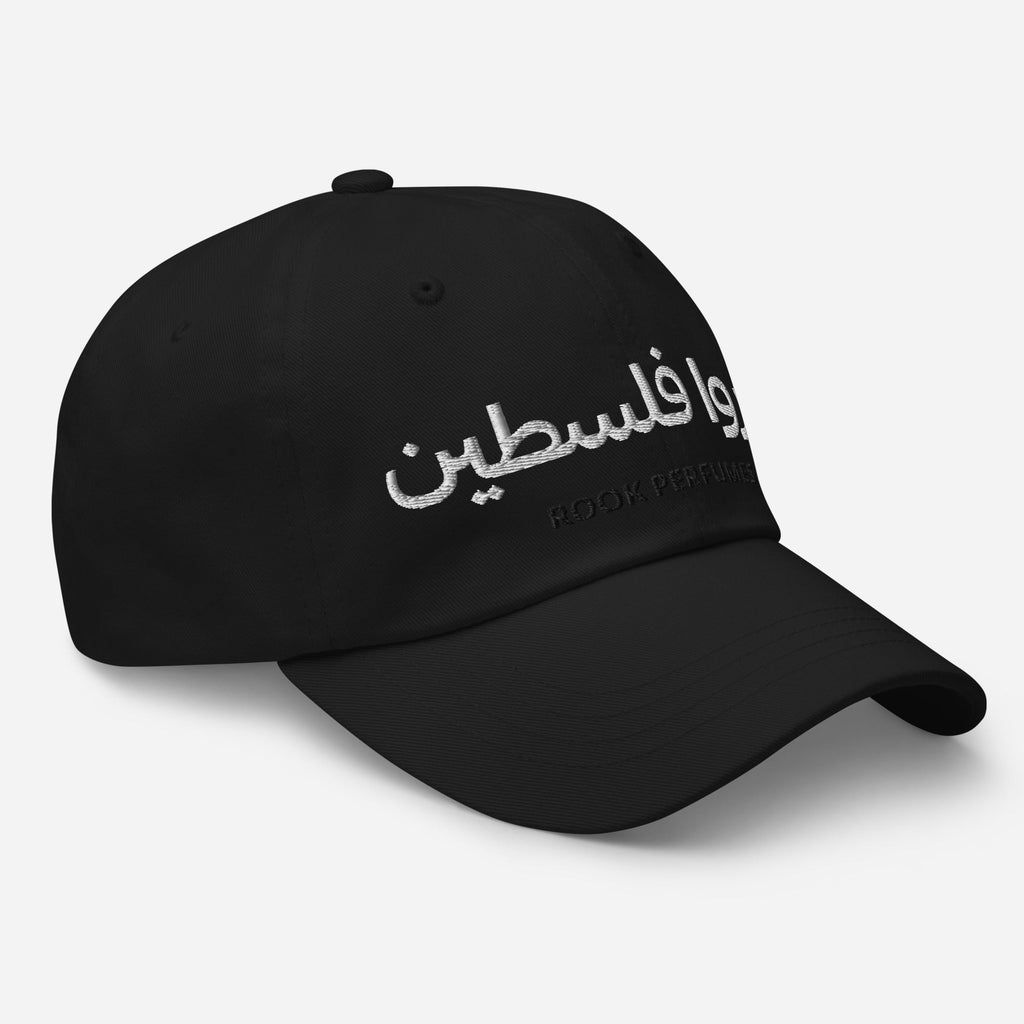 Black cap with "Free Palestine" text by Rook Perfumes, featuring a bold design and unisex style.