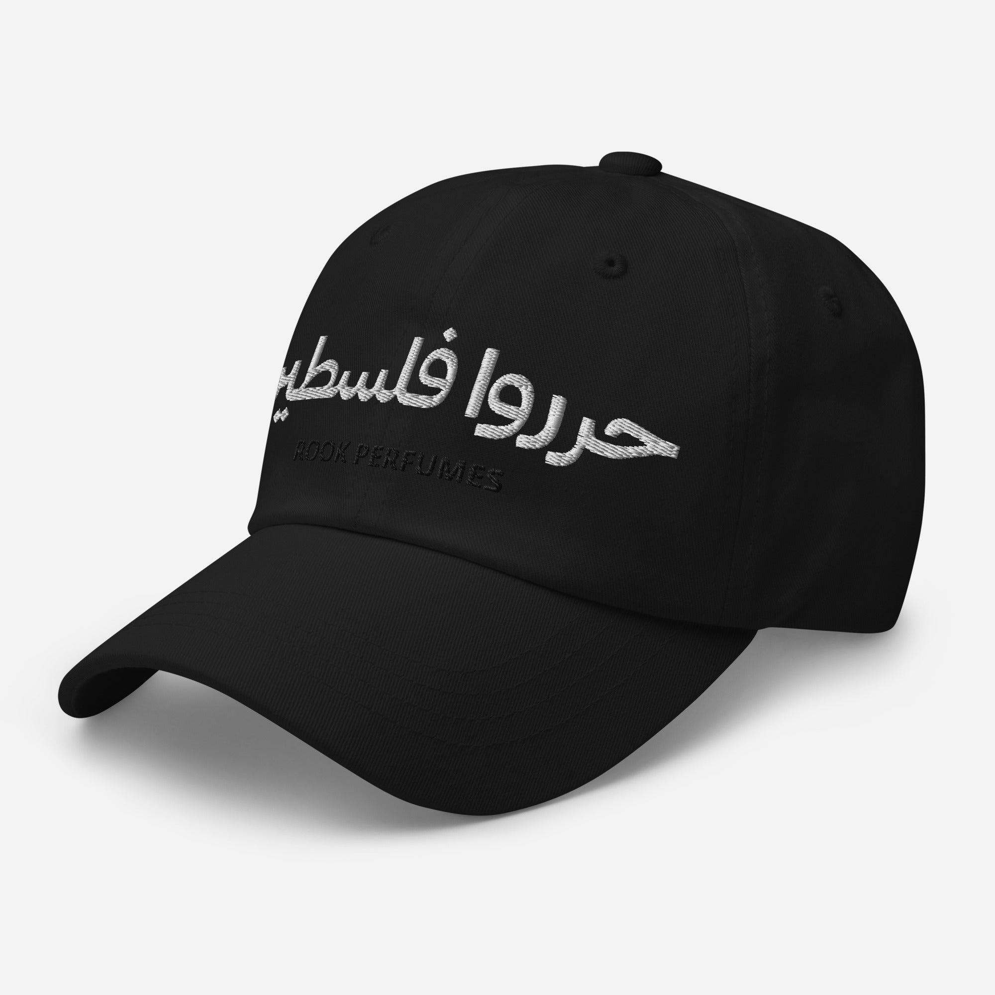 Black cap featuring "Free Palestine" text, designed by Rook Perfumes London, suitable for unisex wear.