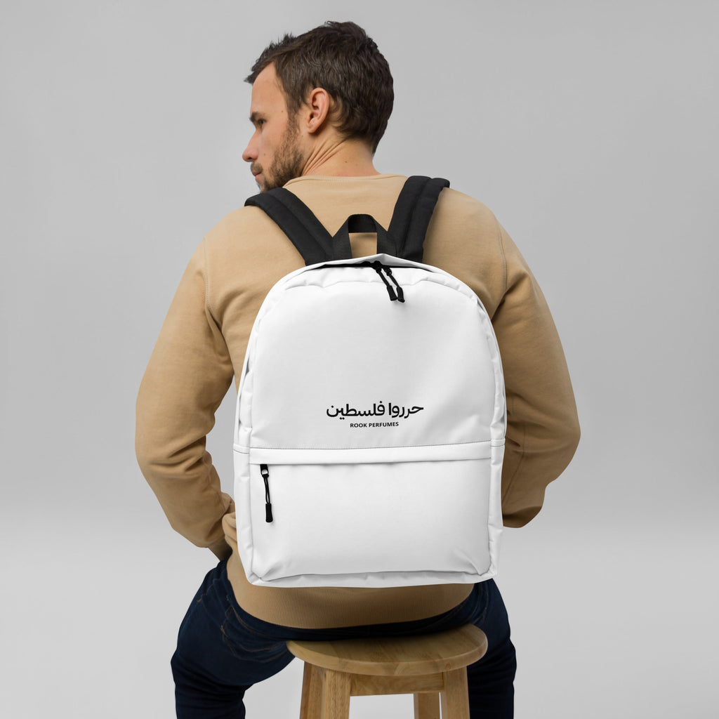Unisex Hidden Watermelon Backpack by Rook Perfumes featuring a stylish design with watermelon motif and adjustable straps.