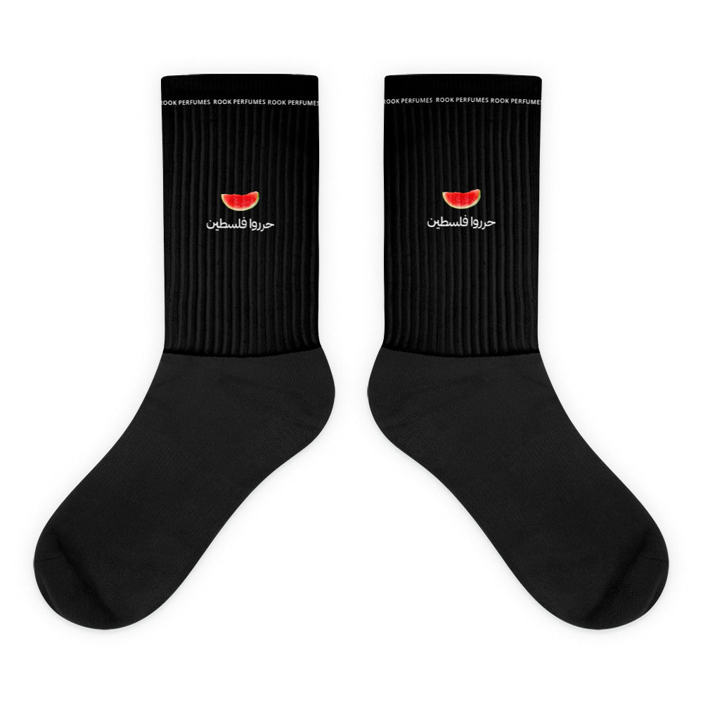 Unisex watermelon socks by Rook Perfumes featuring bright green and pink watermelon pattern on soft fabric.