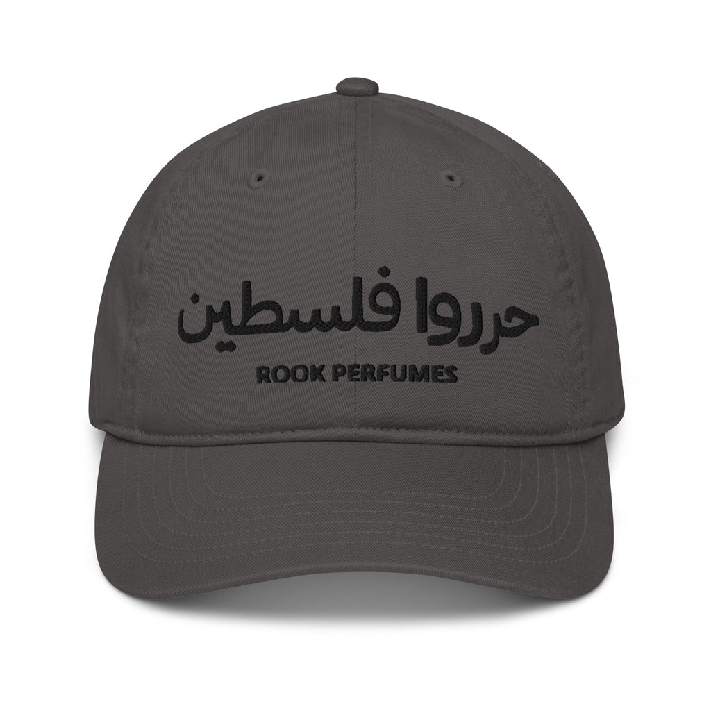 Unisex organic cap with "Free Palestine" slogan by Rook Perfumes, featuring a simple design and natural fabric material.
