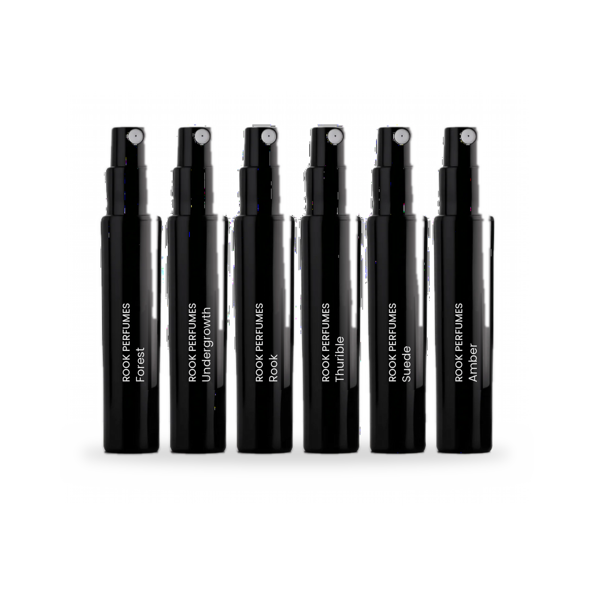 Six Rook Perfumes travel sets with 3ml atomisers, compact and portable for on-the-go fragrance storage.