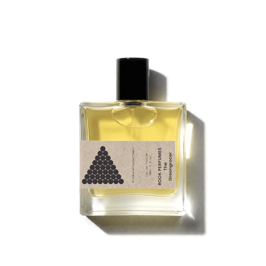 Rook Perfumes The Greengrocer Eau de Parfum bottle with peach, lily, and gasoline notes, showcasing a stylish, modern fragrance design.